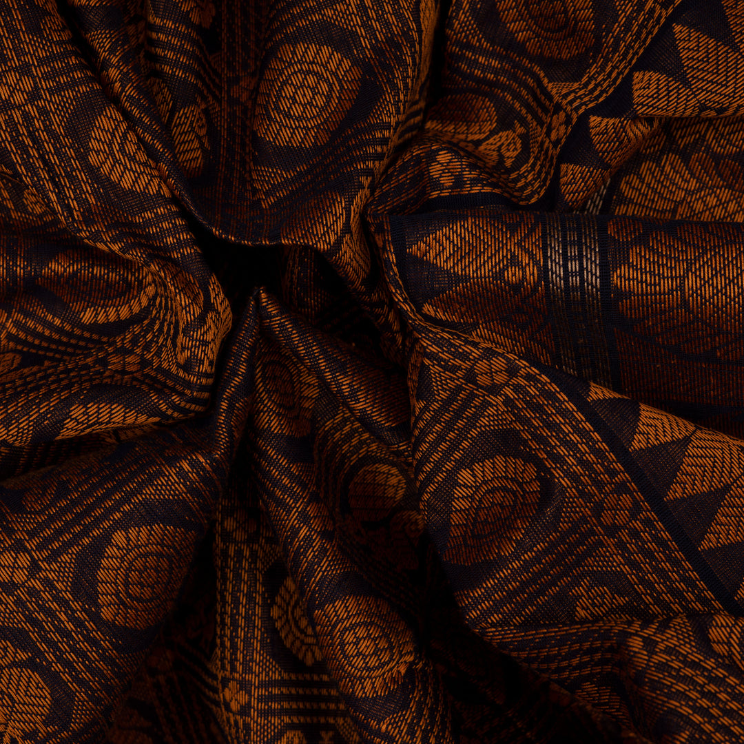 Brown Kanchi cotton saree with annam and chakram checks, maroon border and detailed pallu with matching blouse