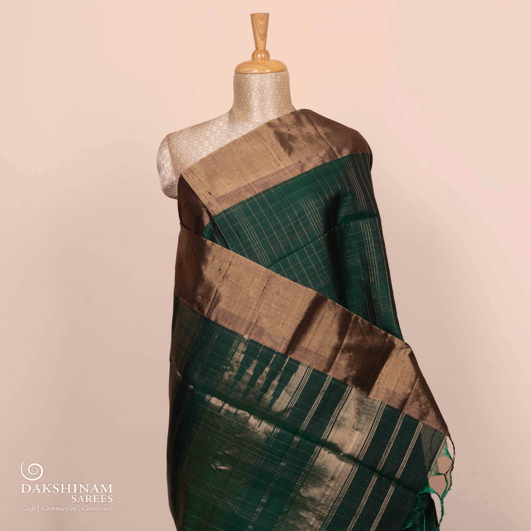 Pleats/body of  Handwoven bottle green dupion soft silk Saree