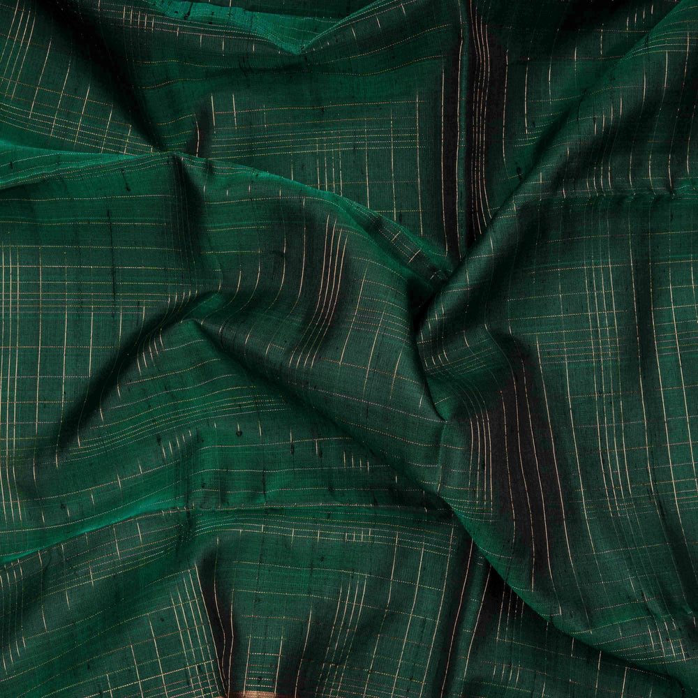 Close-up of green fabric with a subtle pattern