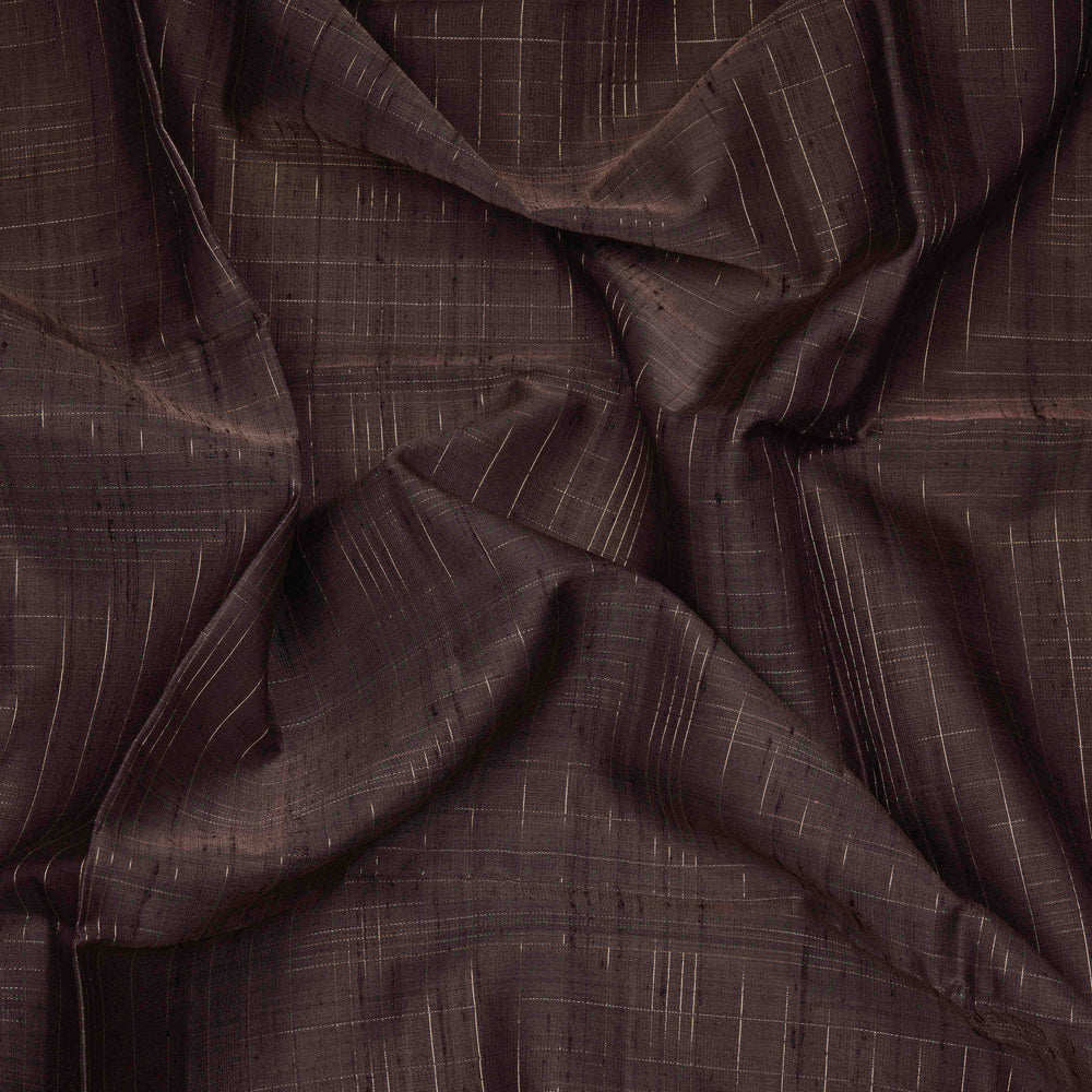 Close-up of brown fabric with subtle pattern