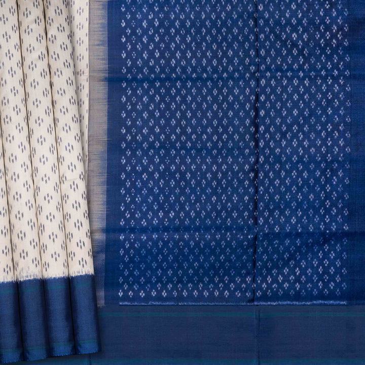 Blue and white patterned fabric of ikat silk
