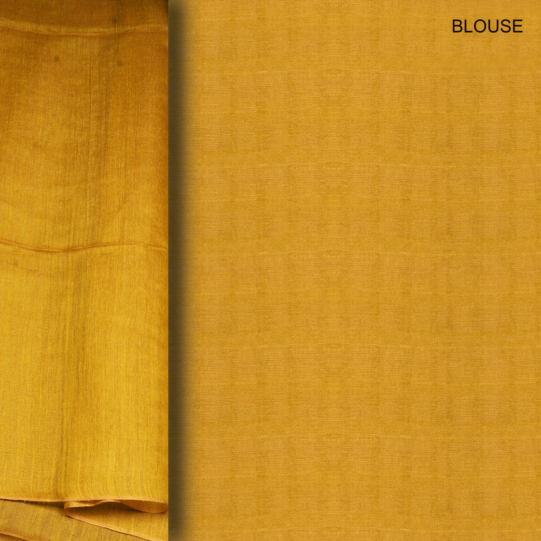 Mustard yellow fabric with 'BLOUSE' text on a plain background