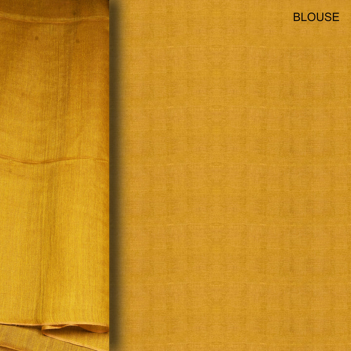 Mustard yellow fabric with 'BLOUSE' text on a plain background