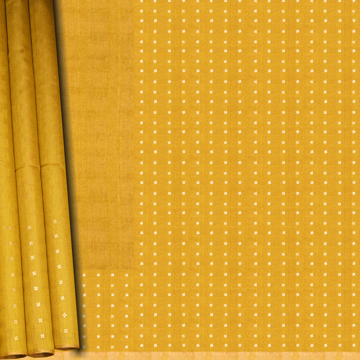 Mustard yellow fabric with a subtle pattern on a plain background
