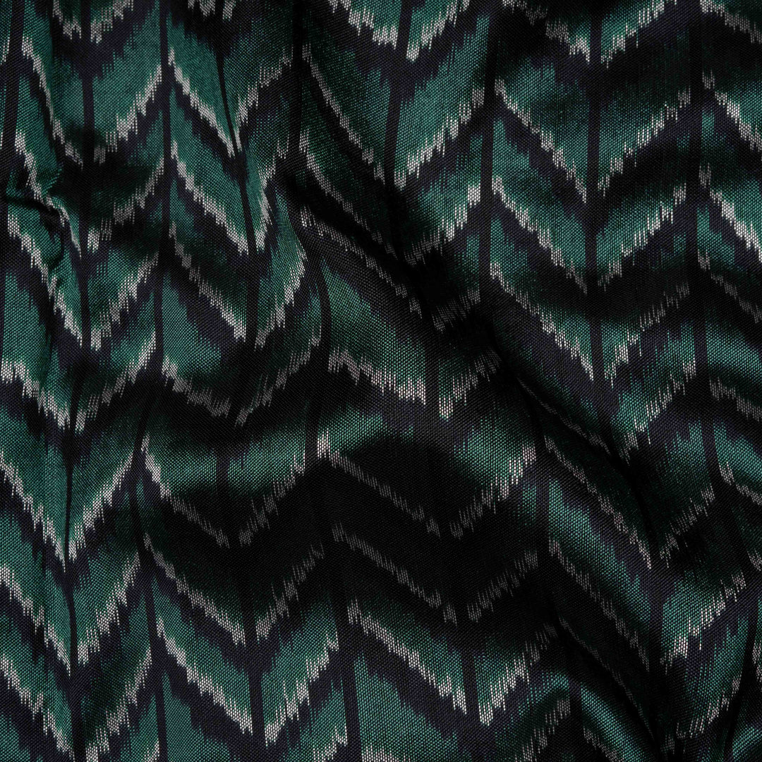 Closeup of Handwoven black Ikkat silk Saree