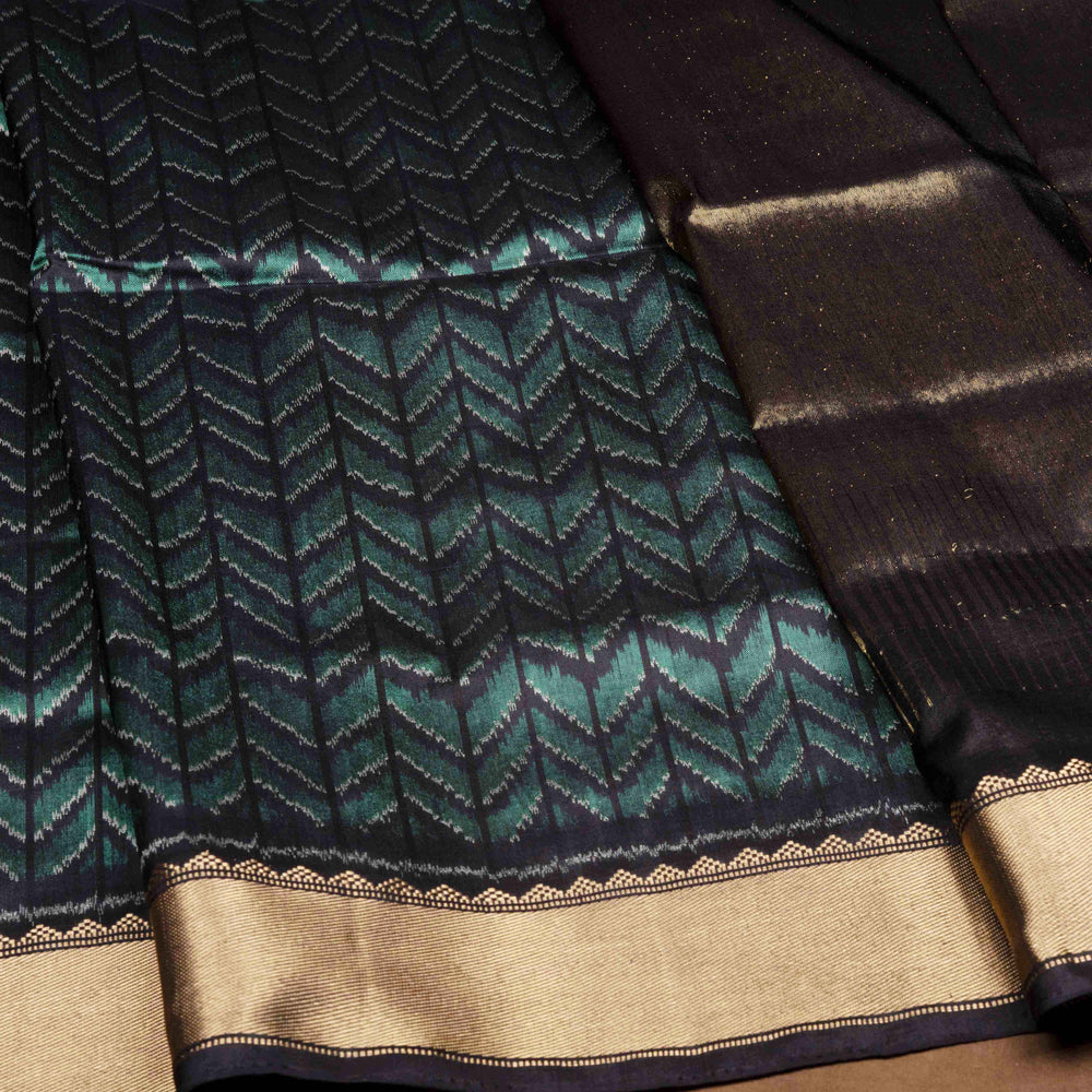 cLOSEUP OF Handwoven black Ikkat silk Saree