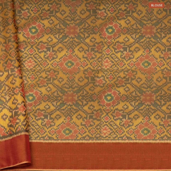 Blouse of Handwoven moss grey and orange Ikkat silk Saree