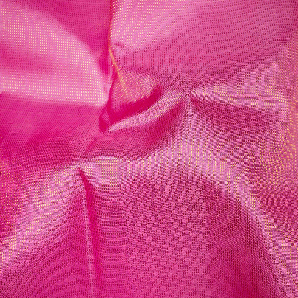 Close-up of pink fabric with a textured surface