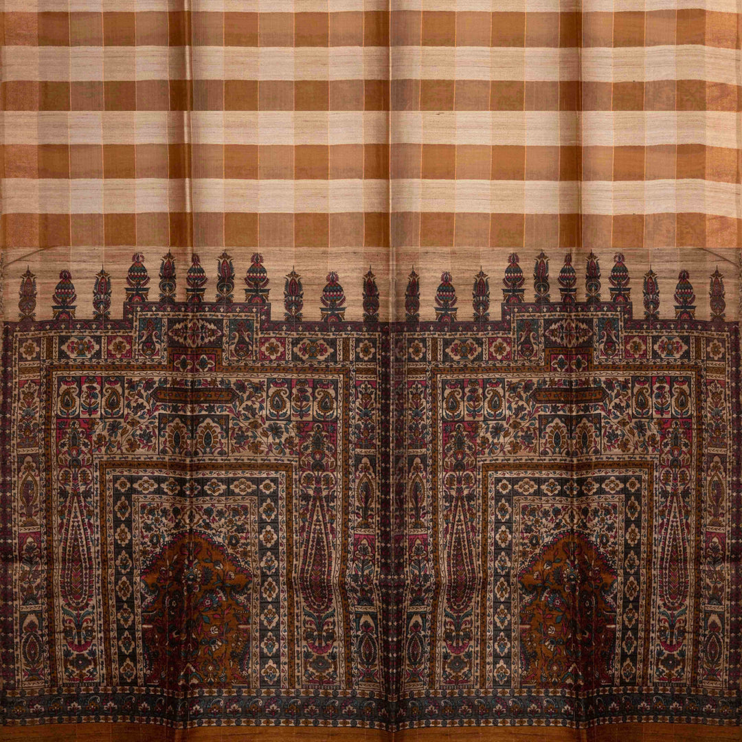 Textile with a checkered pattern and intricate border design.
