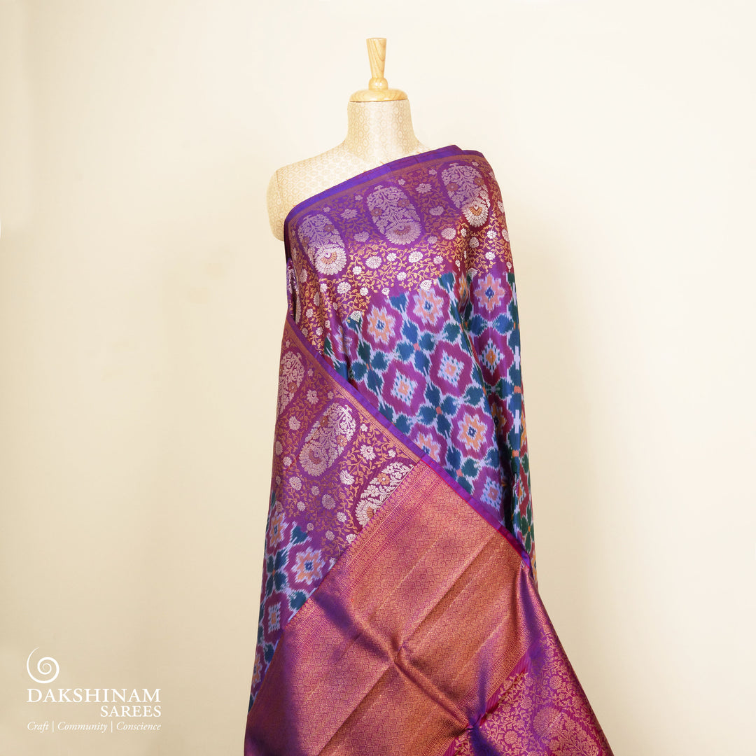Pleats/body of Handwoven Ikat Kanjivaram silk saree in purple color
