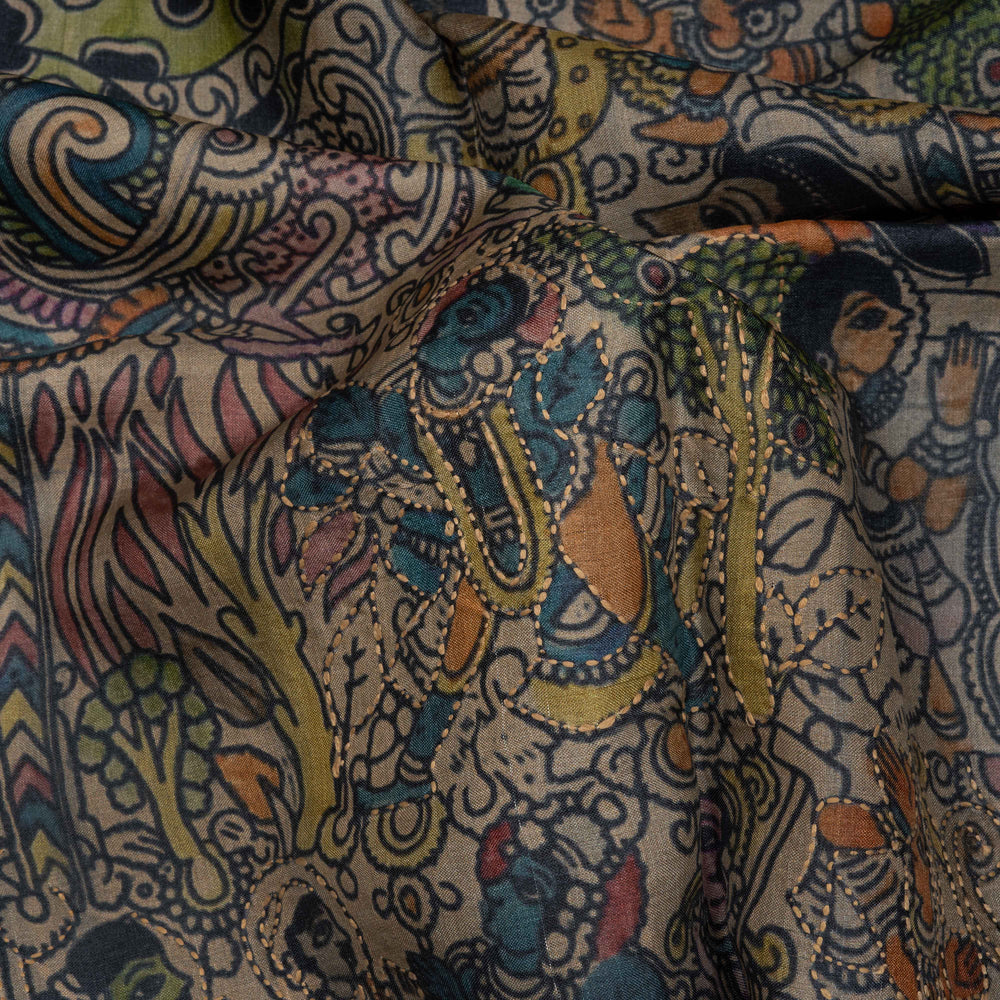 Close-up of a colorful patterned fabric with intricate designs.