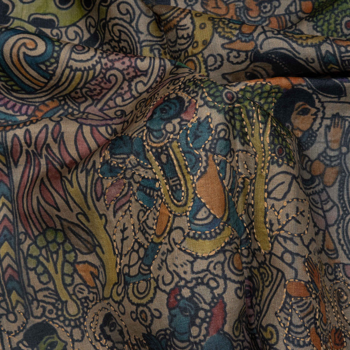 Close-up of a colorful patterned fabric with intricate designs.