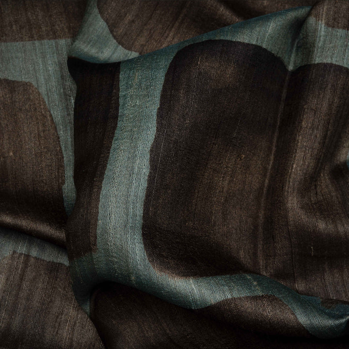 Close-up of brown and green fabric with a textured pattern