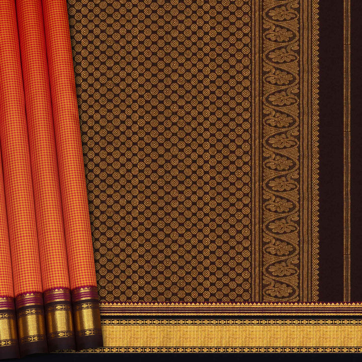 Sari with brown and gold patterned fabric and red border