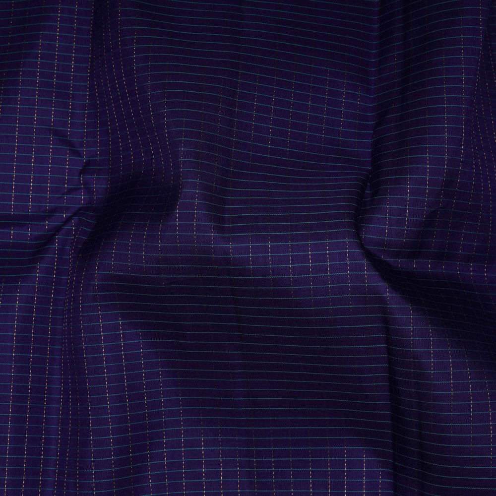 Close-up of dark blue fabric with subtle grid pattern