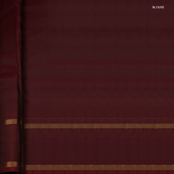 Close-up of maroon fabric with gold stripes, labeled 'BLOUSE'.
