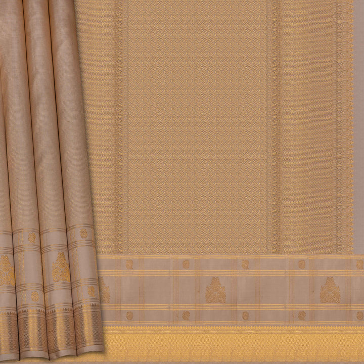 Beige and brown traditional fabric with intricate patterns