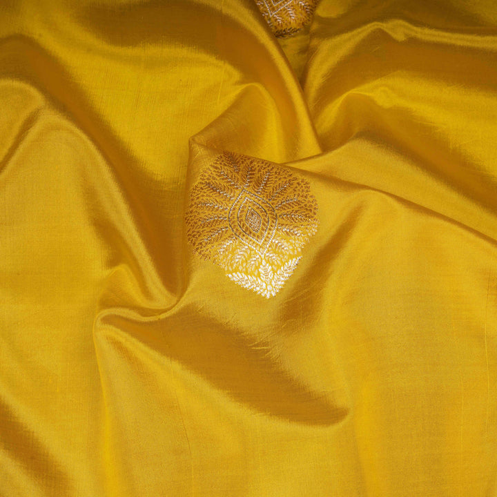 Closeup of Handwoven Yellow Mubarakpur Banarasi silk Saree