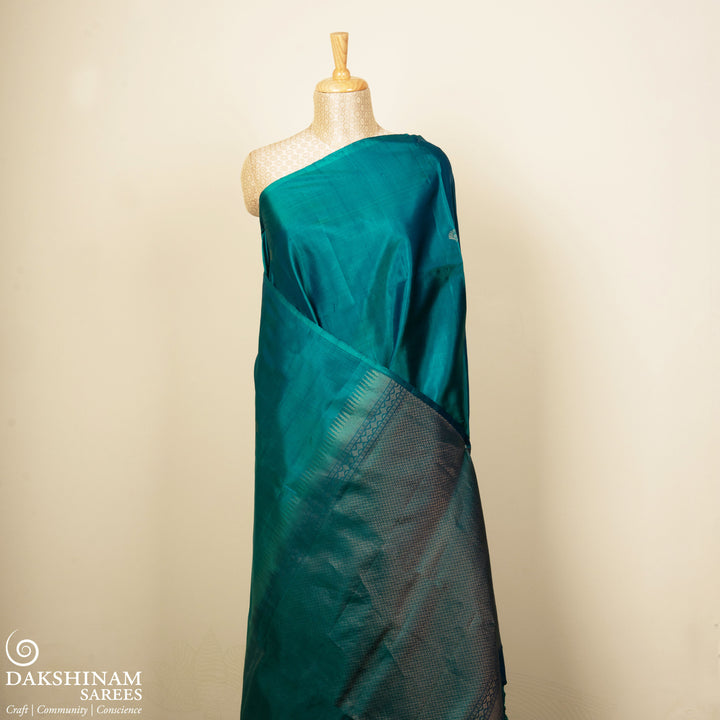 Pleats/body of Handwoven Peacock Blue with Peacock Green color Soft silk Saree