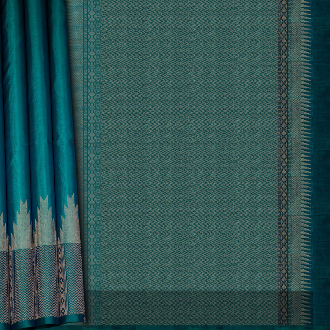 Teal fabric with a woven pattern and border