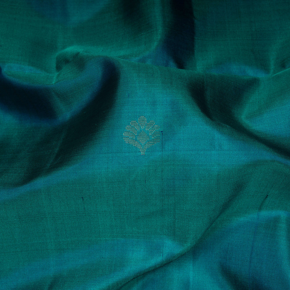 Closeup of Handwoven Peacock Blue with Peacock Green color Soft silk Saree