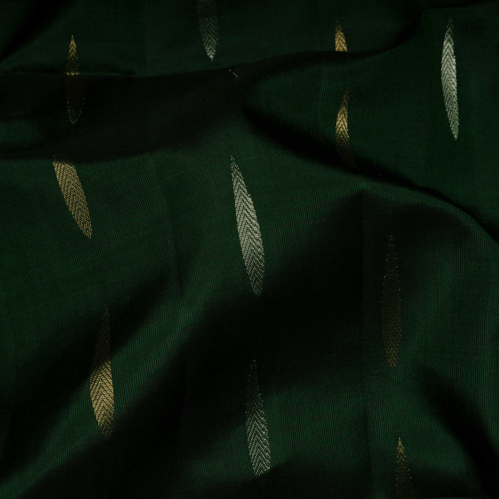 Closeup of Handwoven Bottle Green with Red color Soft silk Saree
