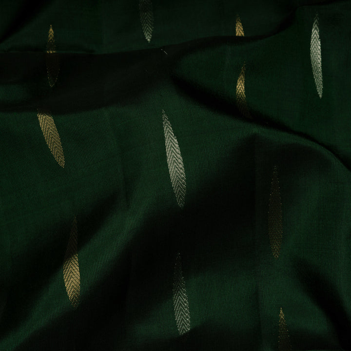 Closeup of Handwoven Bottle Green with Red color Soft silk Saree