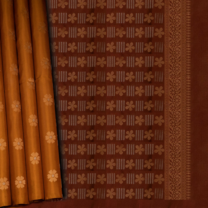 Brown fabric with floral patterns and a yellow border