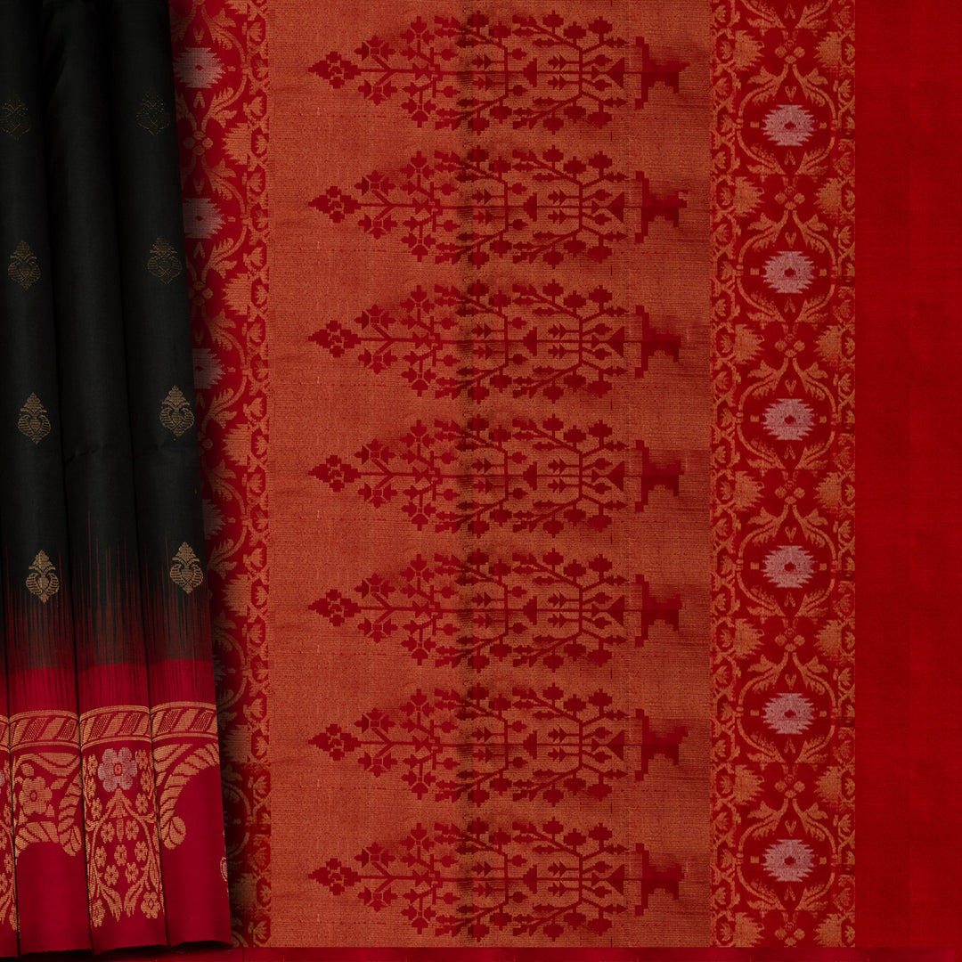 Traditional saree with red and black patterned fabric