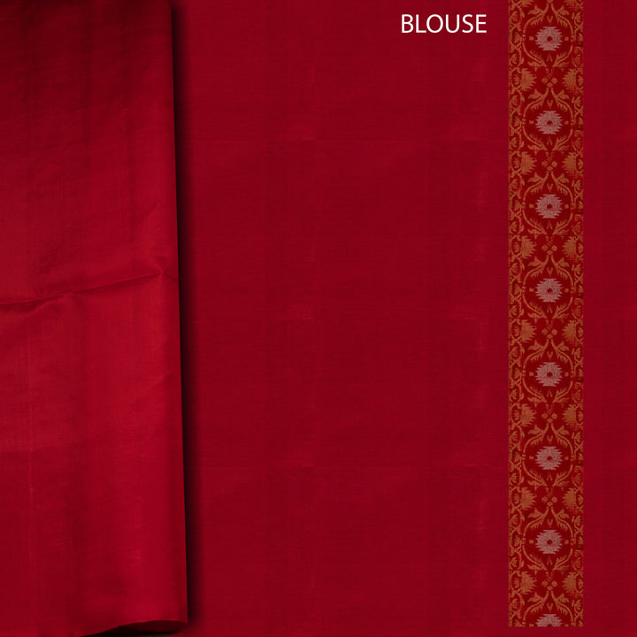 Red blouse fabric with a decorative border on a red background