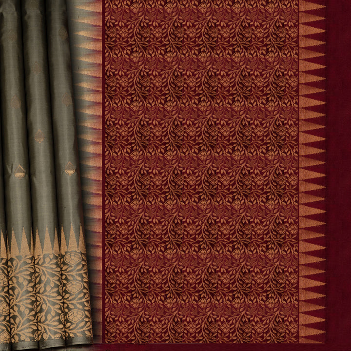 Patterned fabric with a maroon background and gold accents