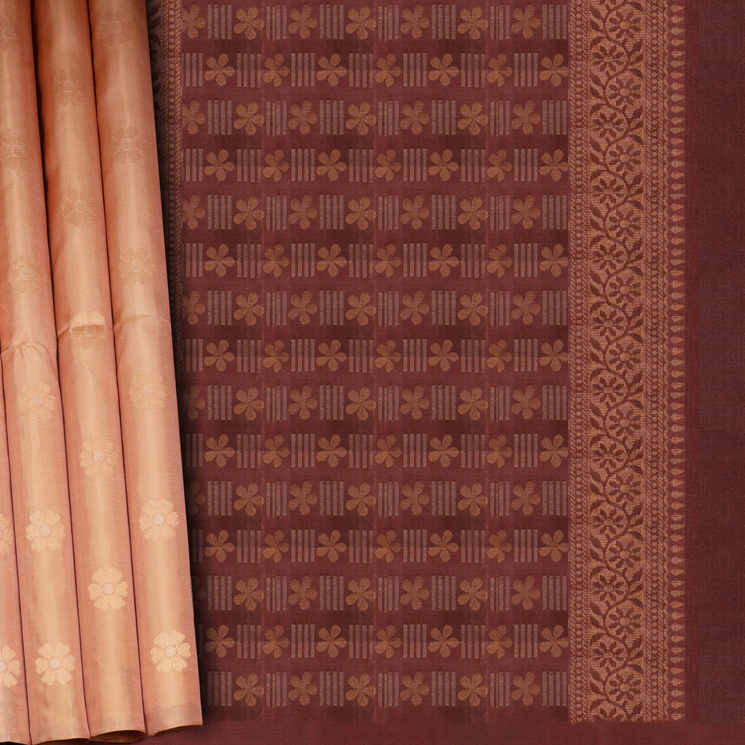 Brown fabric with intricate patterns and a pink curtain on the left side.
