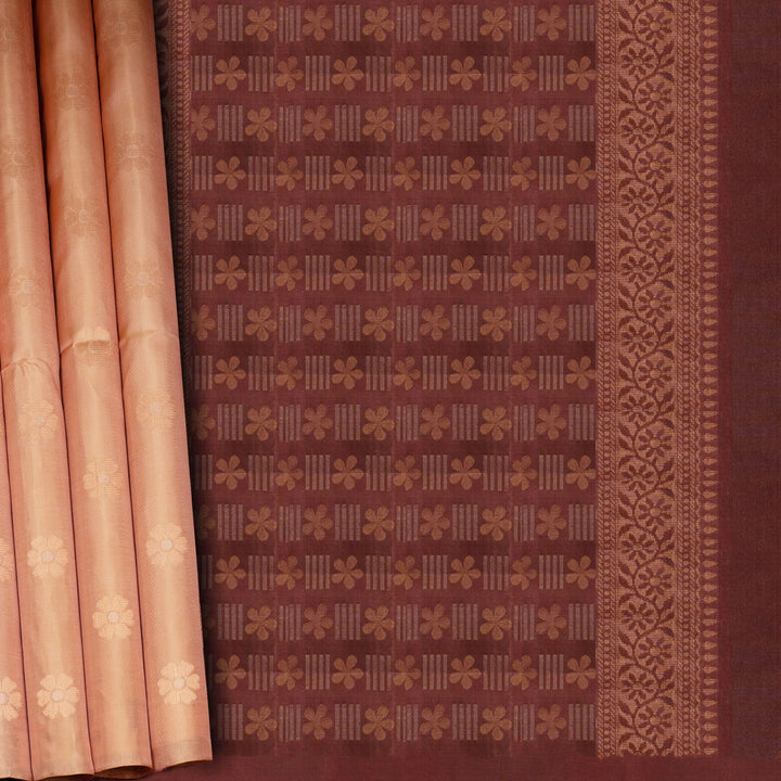 Brown fabric with intricate patterns and a pink curtain on the left side.