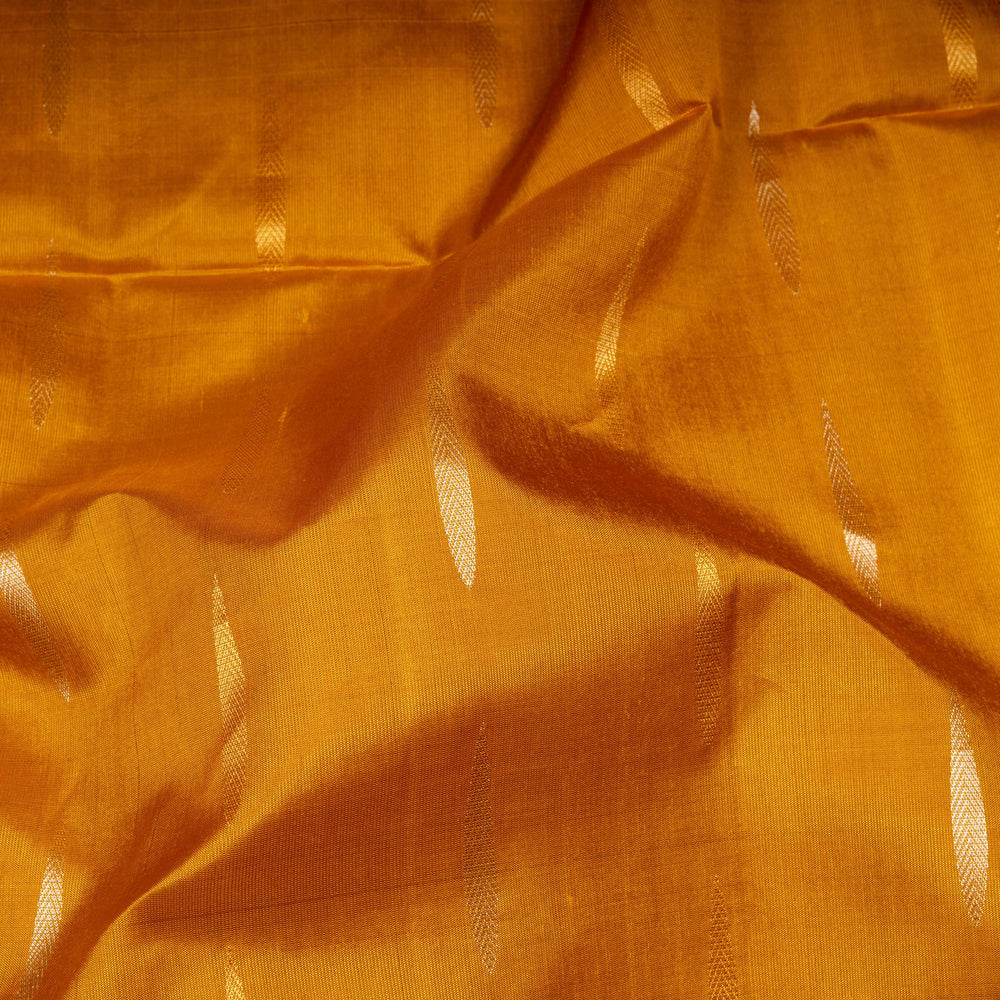 Close-up of orange fabric with subtle patterns