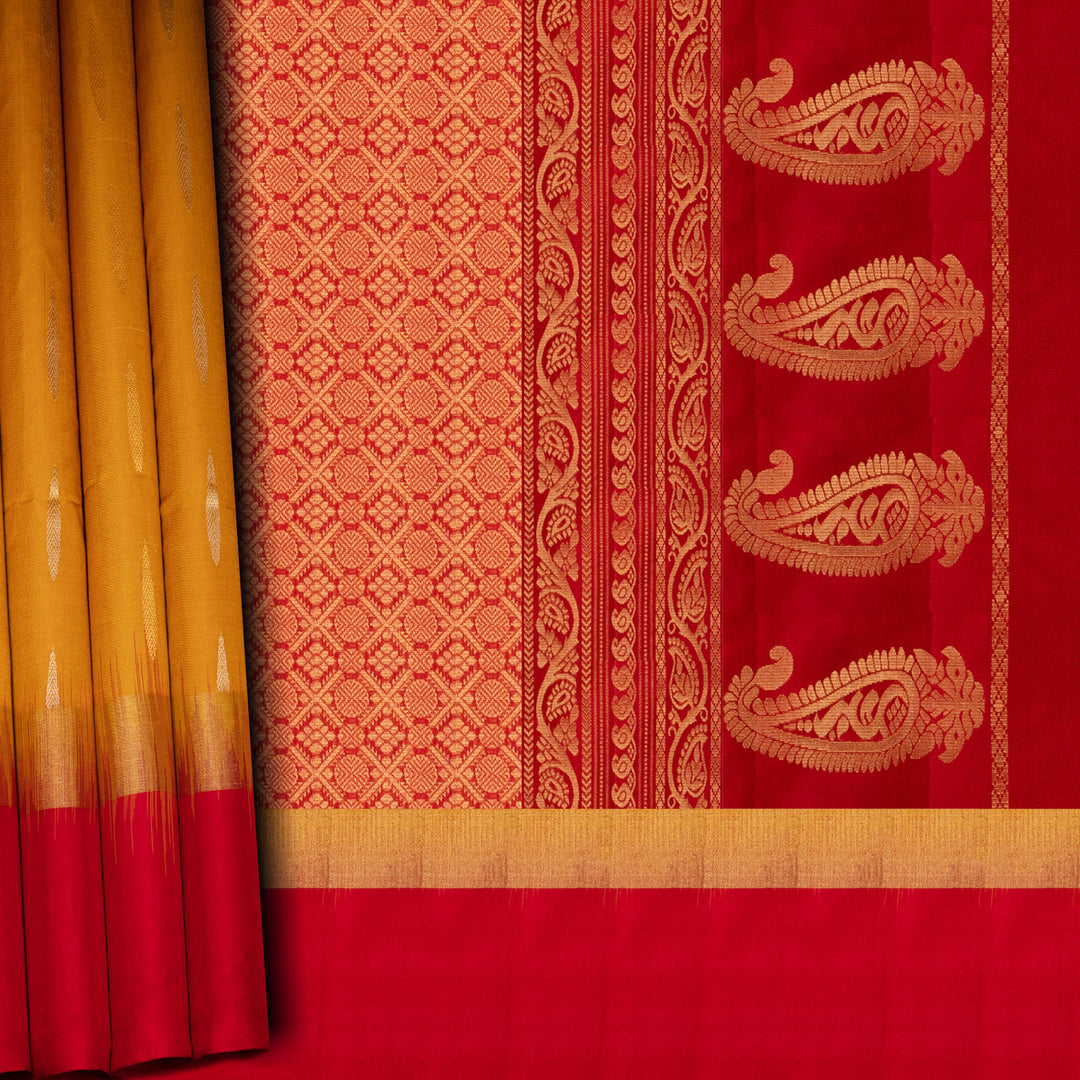 Red and yellow traditional fabric with intricate patterns