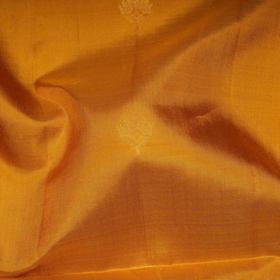 Close-up of orange fabric with visible texture