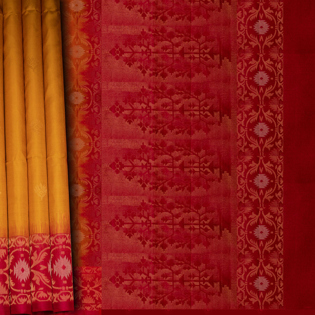 Red fabric with intricate patterns and yellow border