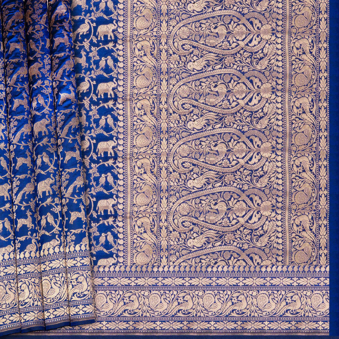 Blue and gold patterned fabric with intricate designs