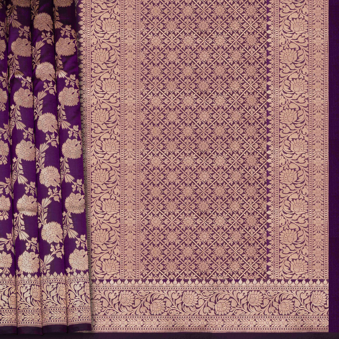 Decorative fabric with intricate patterns in purple and gold