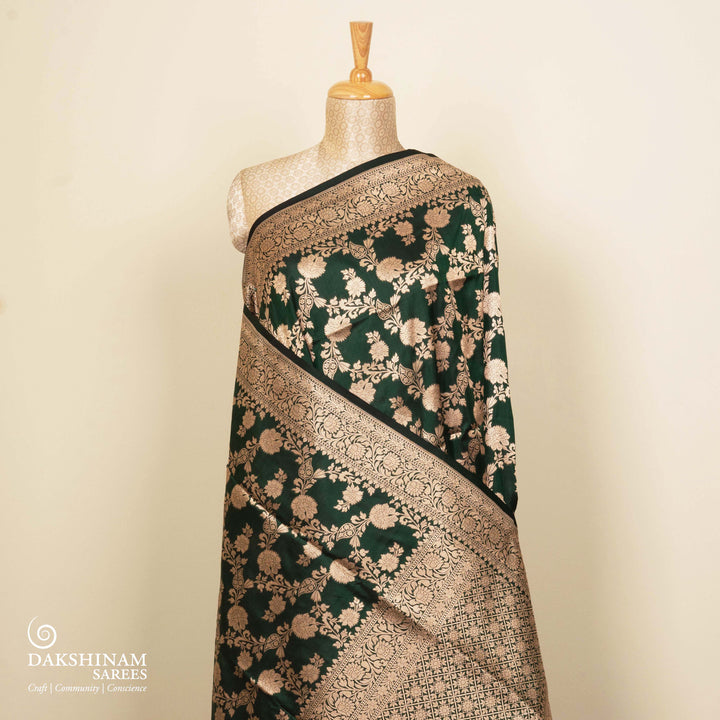 Pleats/body of Handwoven Bottle Green color Banarasi Katan silk Saree