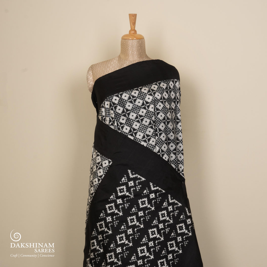 Pleats/body of Handwoven Black with white Double Ikat silk Saree