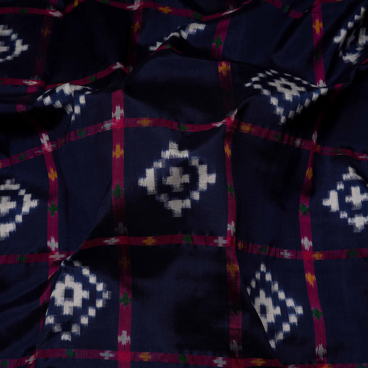 Closeup of Handwoven Navy Blue with Pink Double Ikat silk Saree