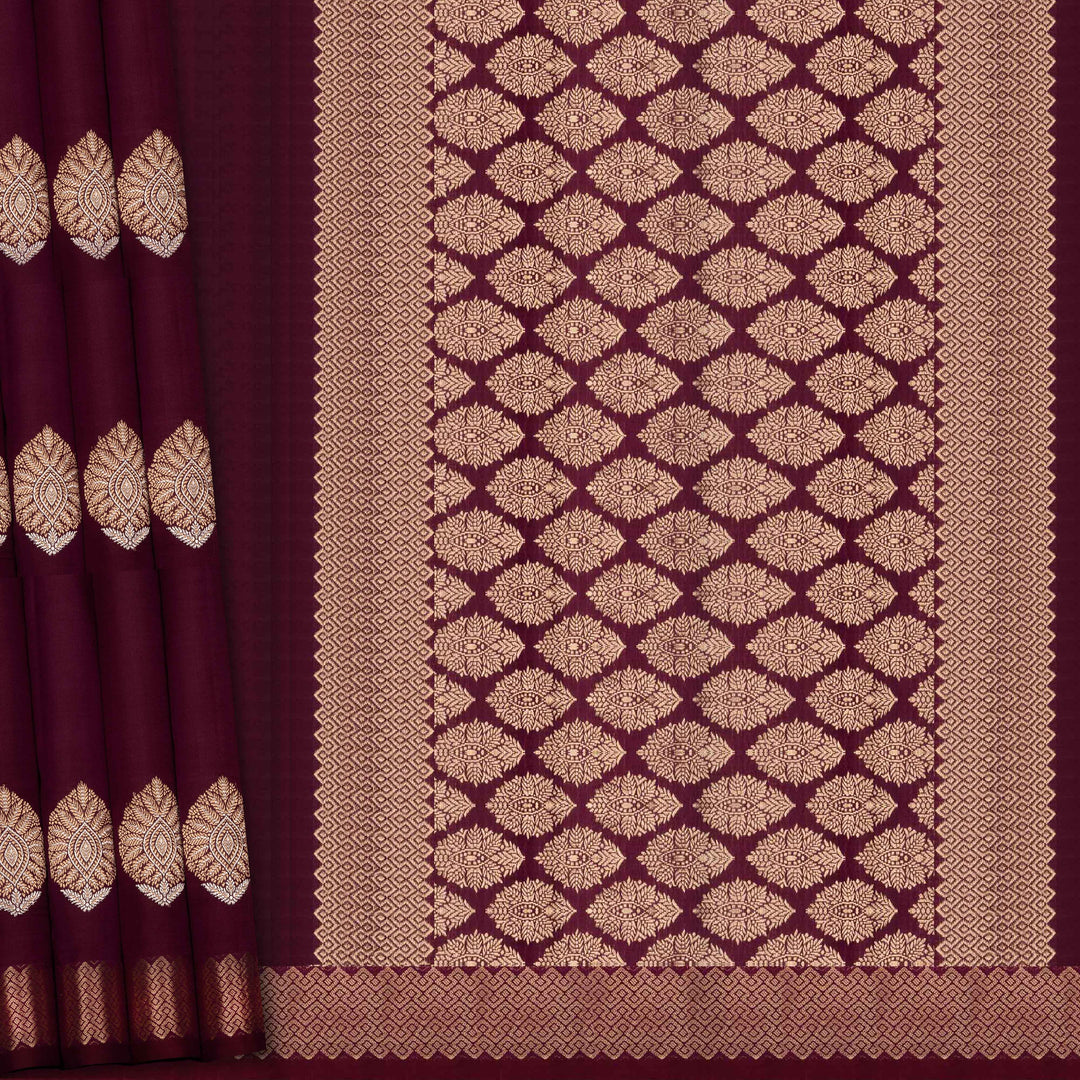 Maroon fabric with gold geometric pattern