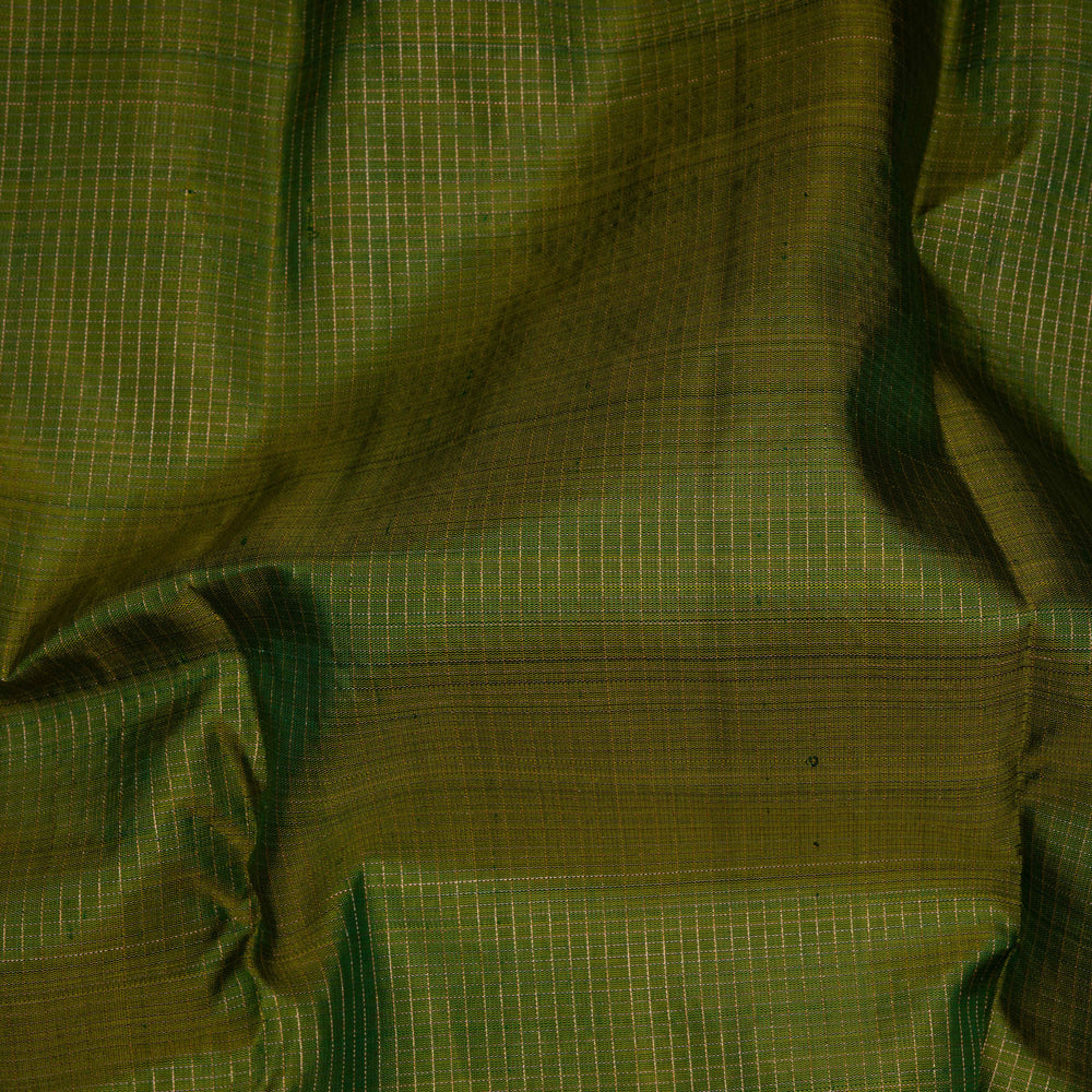 Close-up of green fabric with a grid pattern