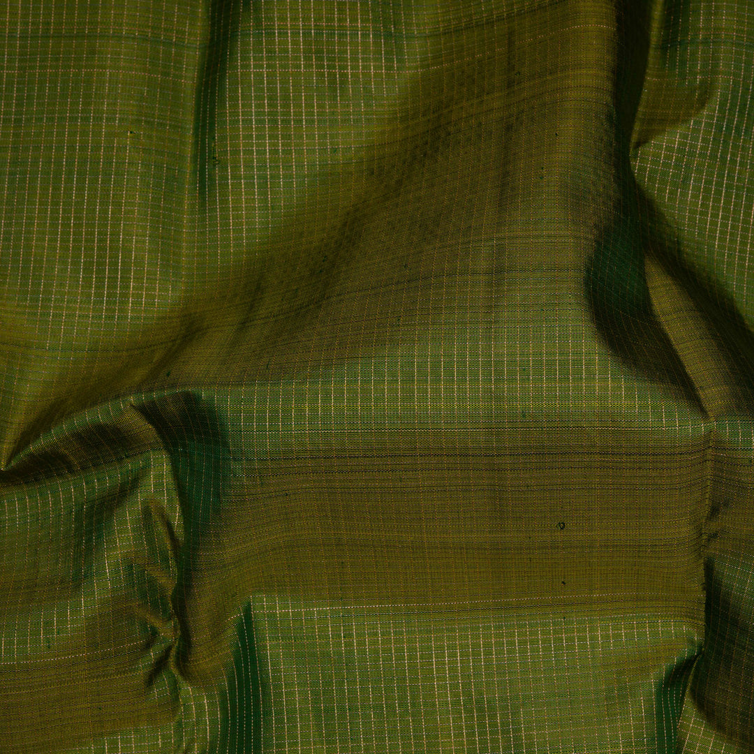 Close-up of green fabric with a grid pattern