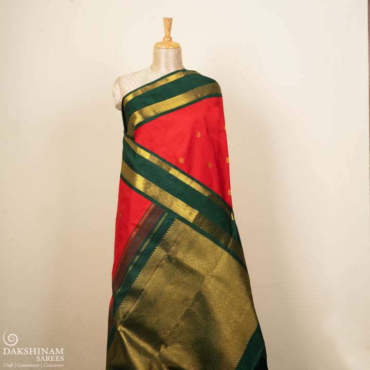 Pleats/body of Handwoven Korvai Kanjivaram silk saree in Red and Green color