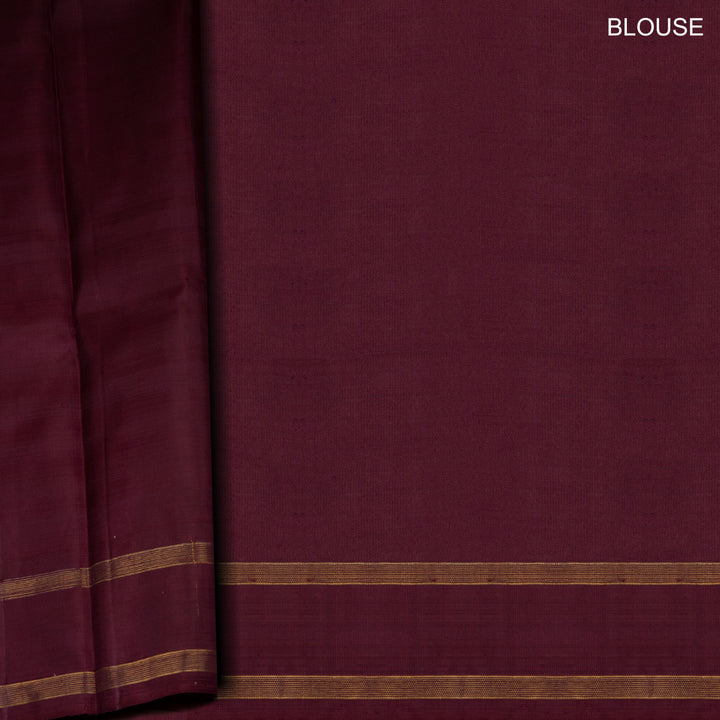 Maroon fabric with gold stripes and 'BLOUSE' text
