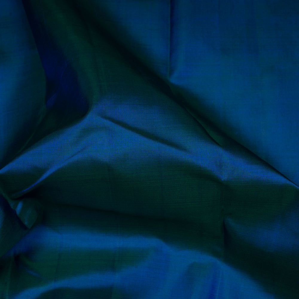 Close-up of blue fabric with folds