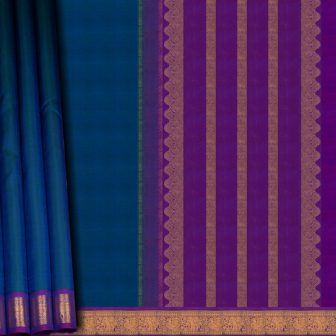 Sari with blue and purple fabric and gold border