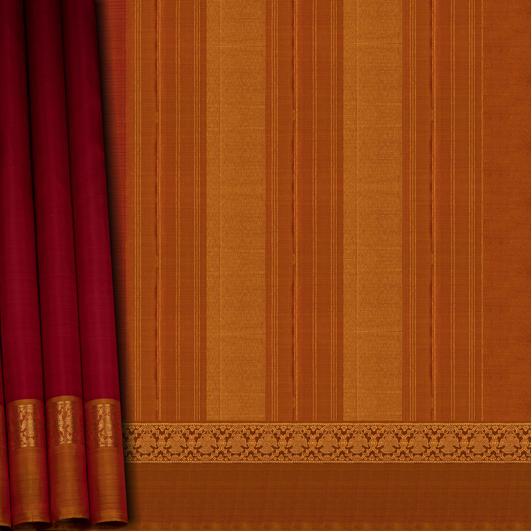 Red and orange fabric with a decorative border